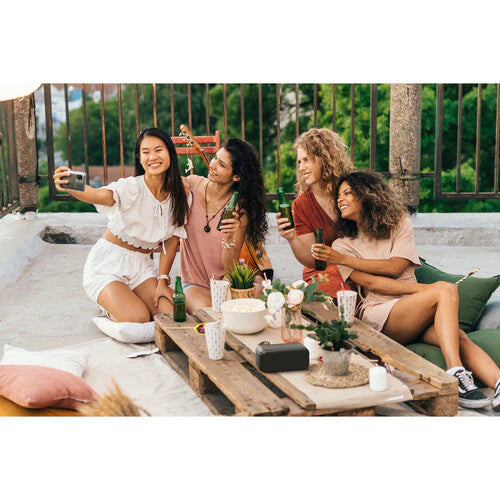 Klipsch Nashville 18W Portable Bluetooth Speaker Waterproof 360 Audio with Family on the backyard