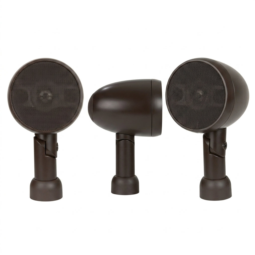 Three dark brown outdoor speakers shown from different angles: two facing forward with round mesh grilles and one shown from the side, all on a solid white background.