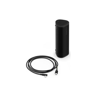 A black Sonos Roam 2 portable Bluetooth speaker standing upright charging cable on a white background