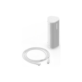 A white Sonos Roam 2 portable Bluetooth speaker standing tall with charging cable on a white background