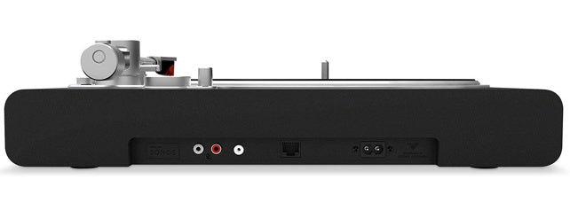 Victrola Carbon VPT-3000 Turntable Ortofon Wireless Sonos-Ready
Side view of a turntable with control knobs and audio jacks on a white background