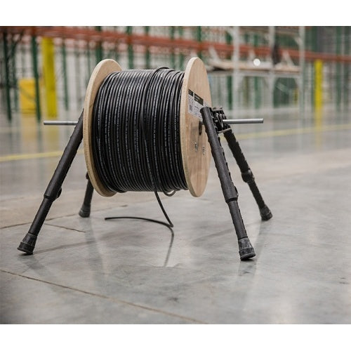 Wirepath SP-CAT6PS-1000-BLK Shielded Plenum Cat6 1000ft Spool of black cable on a stand in an industrial setting