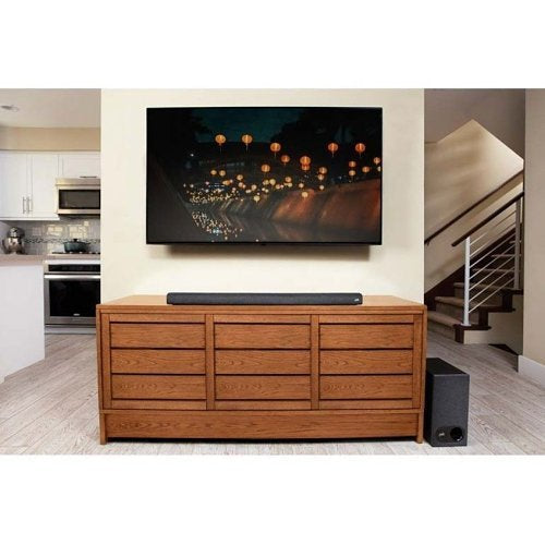Polk Audio SIGNA S3 Slim Bluetooth Sound Bar with Wireless Sub in a living room 