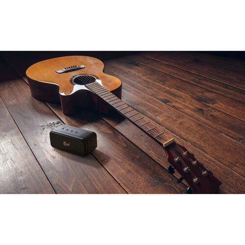 Klipsch Nashville 18W Portable Bluetooth Speaker Waterproof 360 Audio
Acoustic guitar and portable speaker on a wooden floor