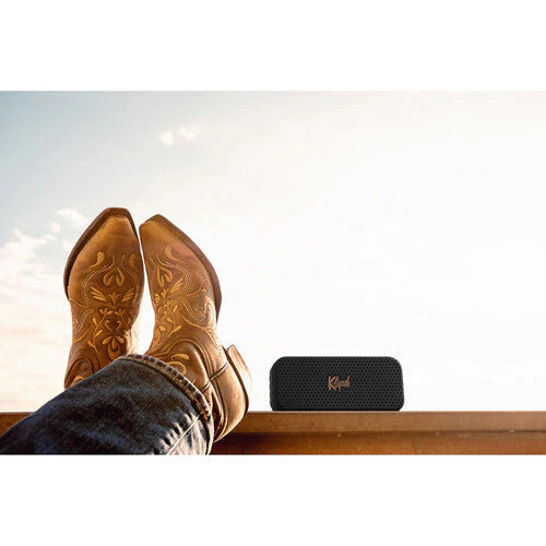 Klipsch Nashville 18W Portable Bluetooth Speaker Waterproof 360 Audio
Brown cowboy boots with a Koolaburra speaker on a wooden surface against a light background