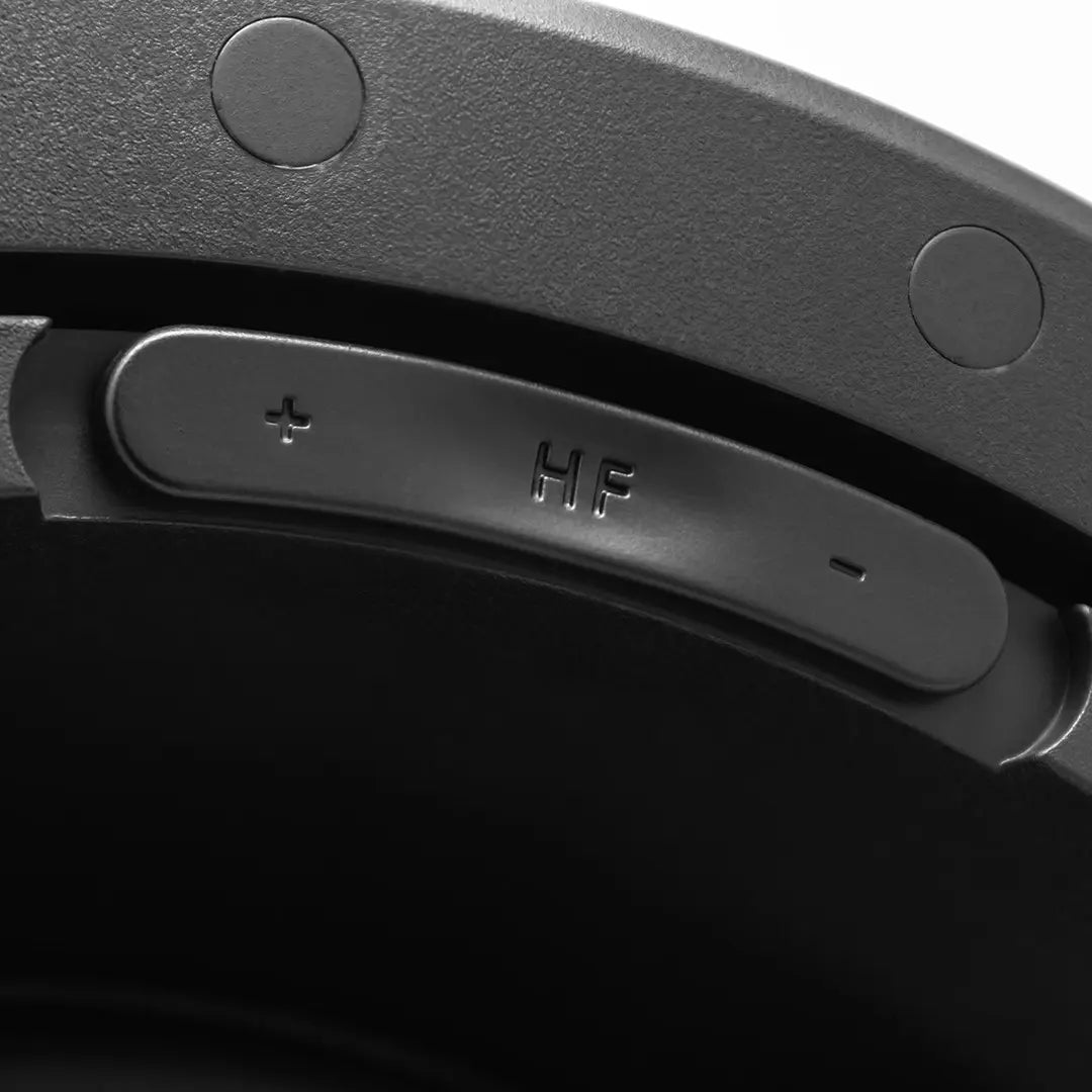 Elura S6.5ST 6.5 Inch Stereo In-Ceiling Dual Speaker by Sonance
Close-up of a black electronic device with control buttons on a dark background