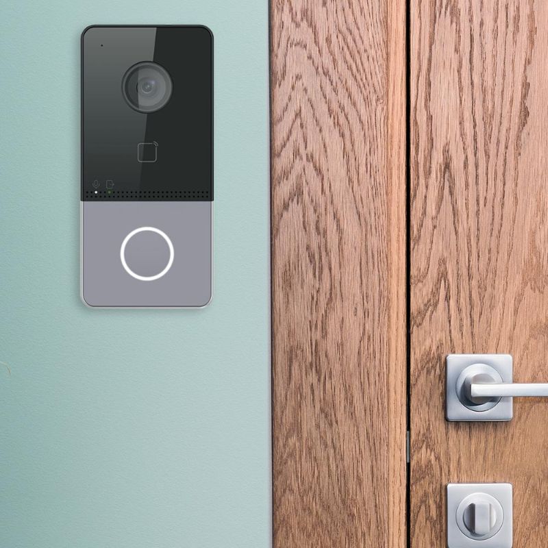 LTH-303M-WIFI mounted on the wall with a wooden door